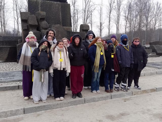 Students at the memorial at the end of the tour