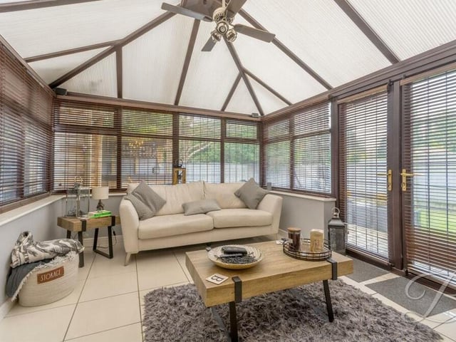 The conservatory at the back of the £365,000 Edwinstowe property is a stunner. Underfloor heating and a ceiling fan add touches of luxury and style.