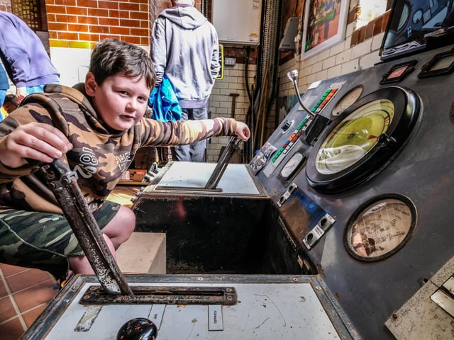 Charlie Brook takes control of one of the pithead machines.
