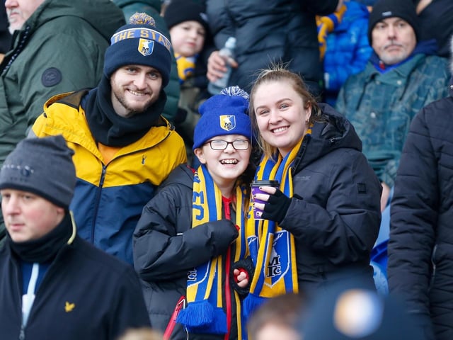 Mansfield Town fans at the One Call Stadium for the Emirates FA Cup third round match against Middlesbrough.