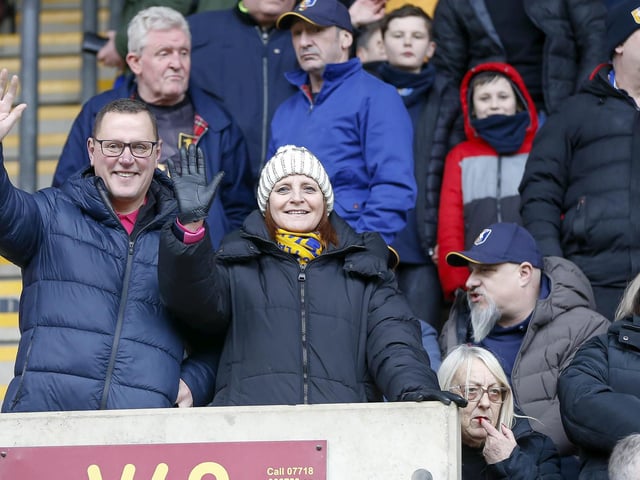Travelling Stags fans watch the Sky Bet League 2 match against Bradford City.