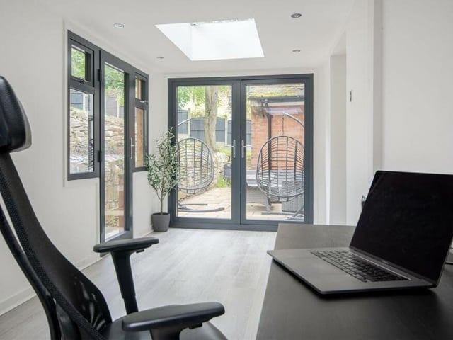 Next stop at the Mansfield mansion is this office or leisure room. A bright and modern space with its own access side-door, it features skylights, external cedar wood cladding and French doors opening on to a beautiful Indian sandstone patio. It is fantastic for working from home.