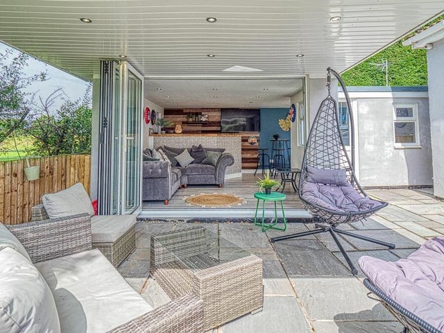Time to work out whose round it is as we approach the bi-folding doors that open into the bar and games room.