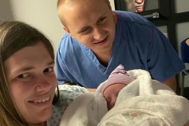 First-time dad Nathan Edge, mum Emma and baby Oliver after the birth.