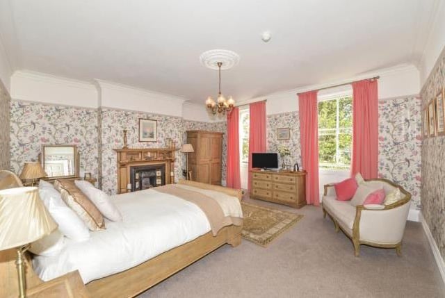 One of the eight bedrooms.