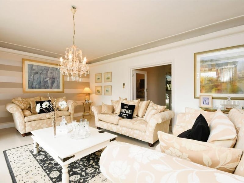 The lounge at the £750,000-plus property from a different angle. Like the reception room, it has a porcelain tiled floor.