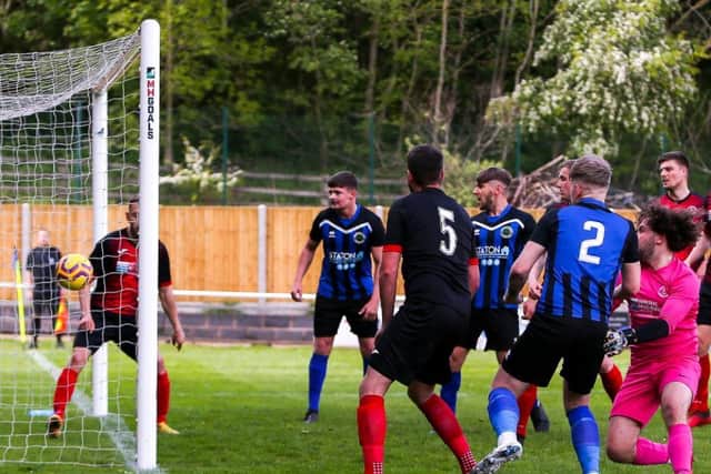 Carter Widdowson (No. 2) scoring Sherwood Colliery’s second goal in a 2-0 win v. Ollerton Town on Saturday.