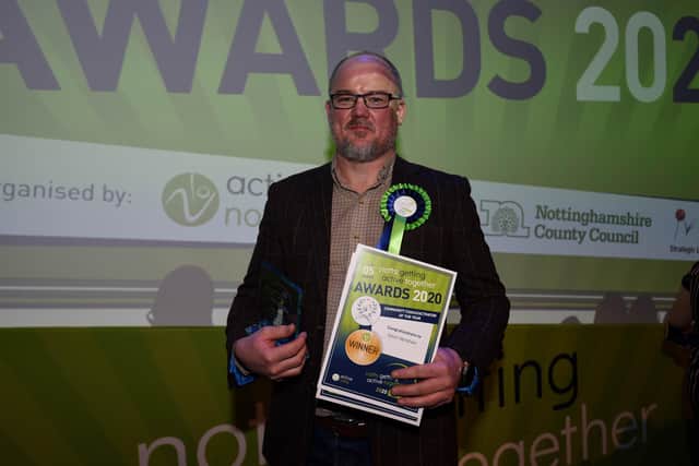 Kevin Henshaw with his Community Coach of the Year award. Photo: Marc Dewhurst