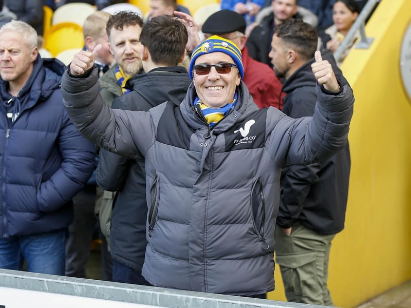 Mansfield Town fans ahead of kick-off against Rochdale on 10 April 2023.
