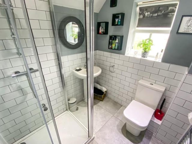 This is the third and final en suite at the property. Recently refurbished, it can be found on the second floor, attached to one of the two bedrooms there.