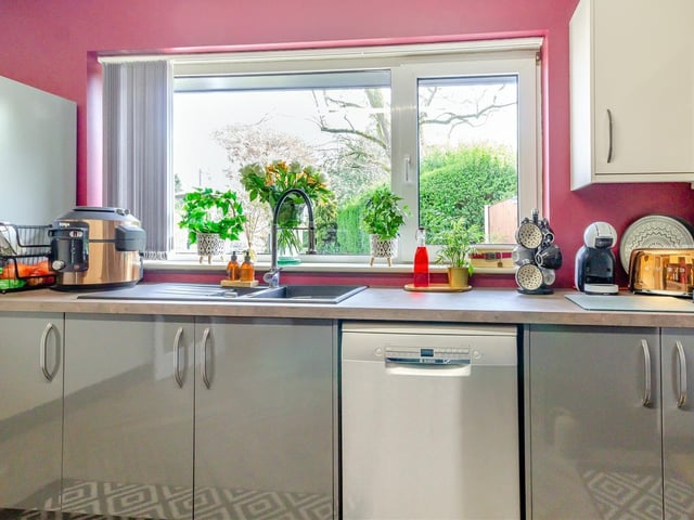 The kitchen at Greenways is also bright thanks largely to a window at the back that offers garden views.