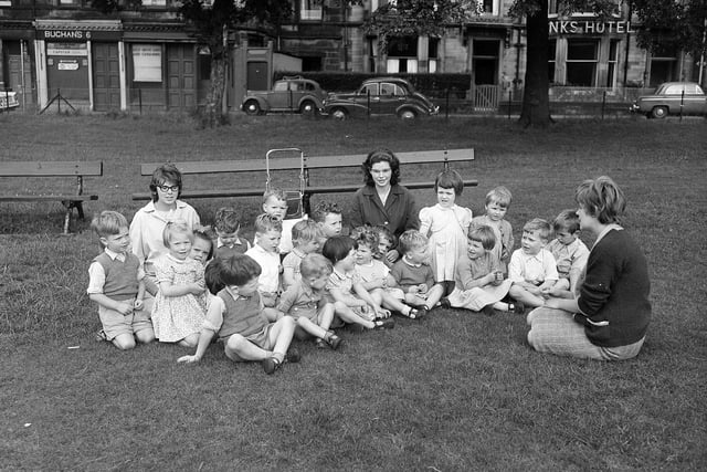 Kids from the Canaan Lodge Childrens Home enjoying a singsong on Bruntsfield Links in August 1963.
