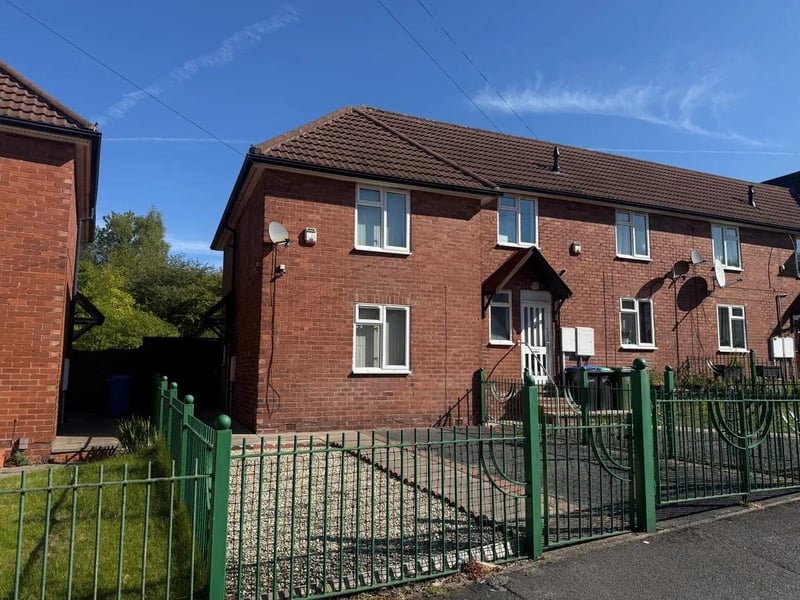 The property briefly comprises to the ground floor of a welcoming living room, a ground-floor shower room, and a fitted kitchen with access to the rear garden. To the first floor are two large double bedrooms, both offering generous space and natural light. Externally, the property benefits from a gated driveway to the front providing off-road parking for one vehicle. To the rear is a low-maintenance enclosed garden, complete with a patio seating area and a pergola positioned over the back door, ideal for outdoor dining and entertaining.
