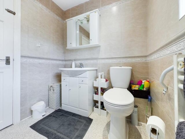 The amount of storage space available is a real bonus in such a compact shower room.