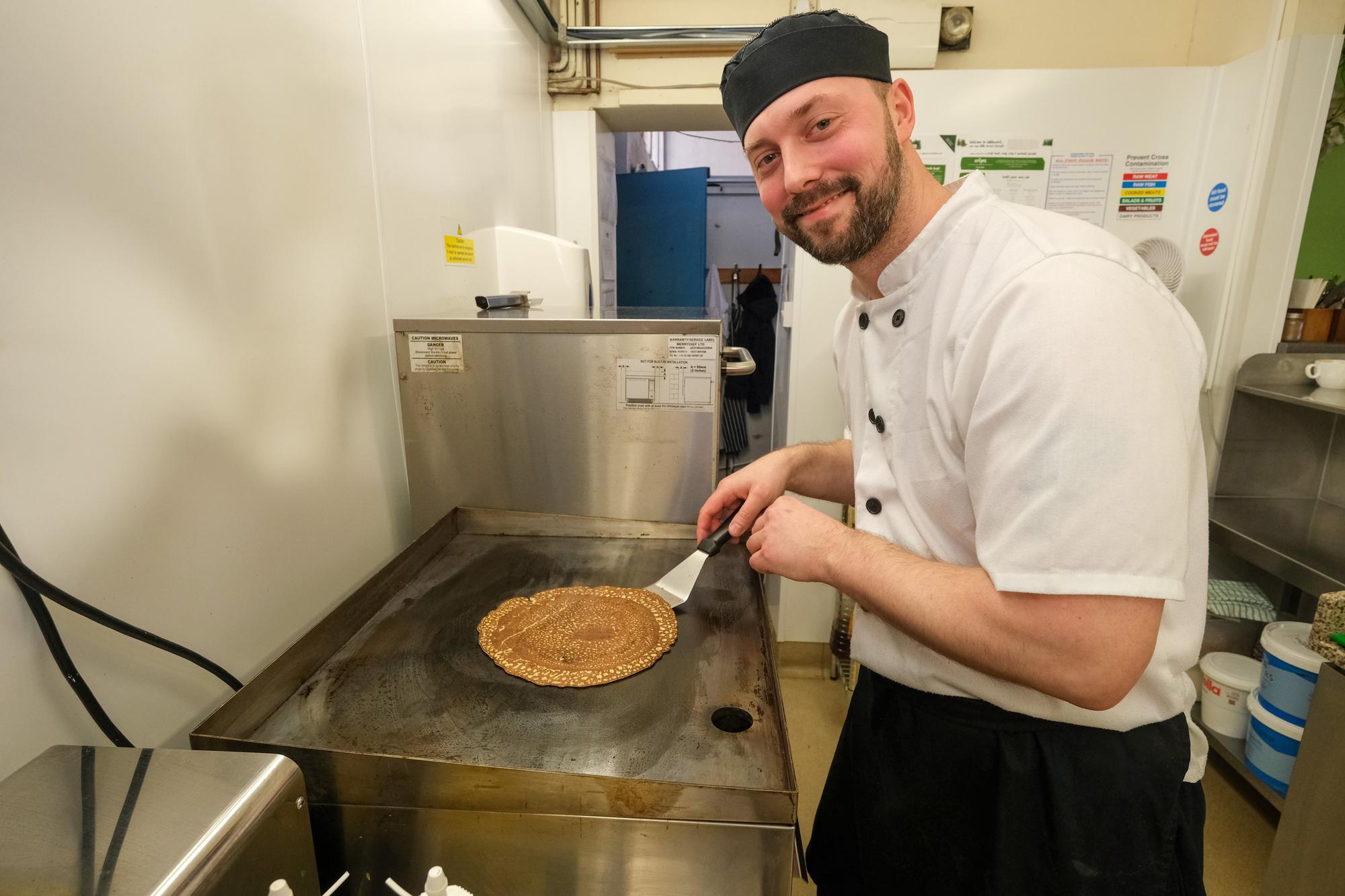 Carl Shepherd making pancakes at Wildwood in Sheffield City Centre