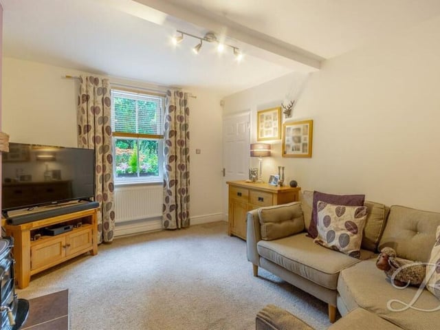 The snug on the ground floor can act as an extra reception room or it could be converted into the £425,000-plus property's fourth bedroom. The floor is carpeted, and the window faces the front of the house.