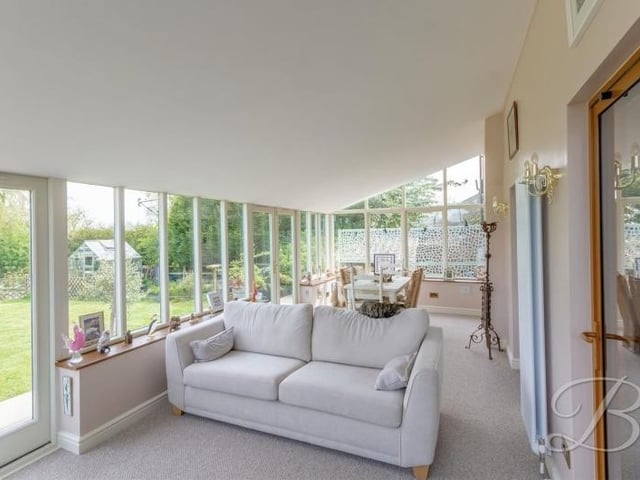 A second shot of the first conservatory, which offers natural light and comfort.