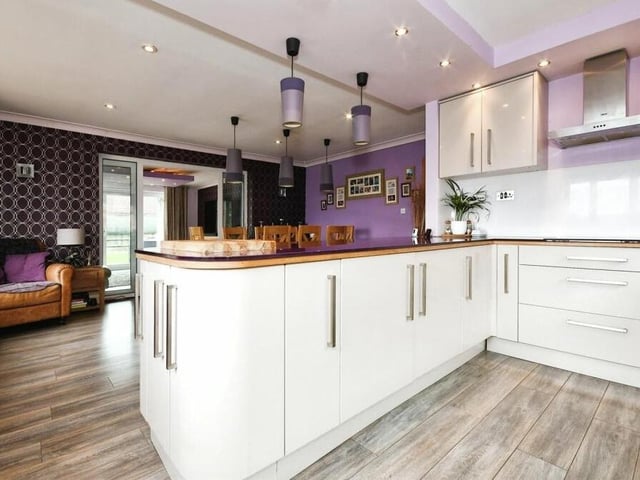 As well as multiple appliances and storage space, the kitchen diner has some living space.