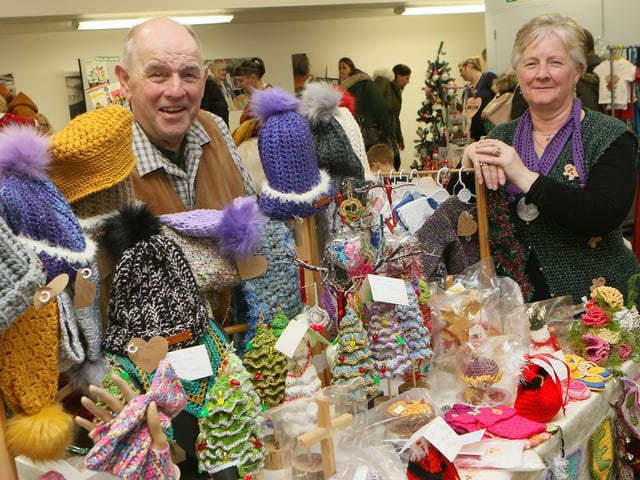 Ken and Mandy Moore with a stall full of colourful homemade items.