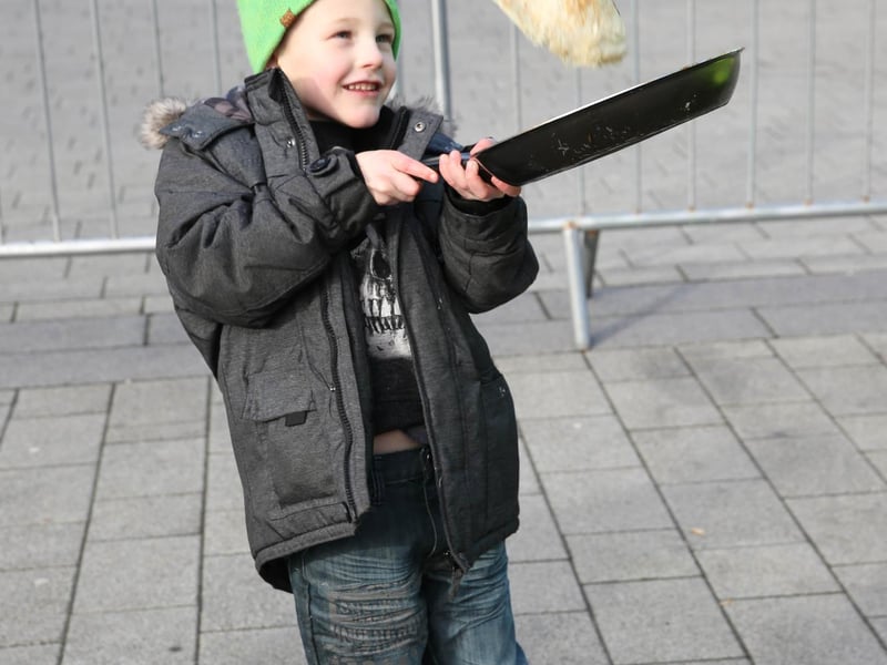 Pancake Day in Doncaster Market Place with Jaiden Horsfield age 5 in 2016