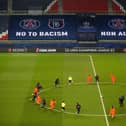 The Champions League match between PSG and Istanbul Basaksehir was abondoned following accusations of racism from the fourth official. (Photo by XAVIER LAINE/POOL/AFP via Getty Images)
