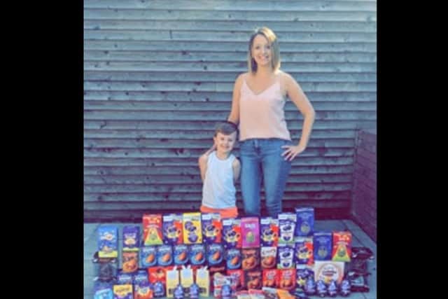 Natalie Gillespie with son Freddy and the Easter Eggs donated by residents of Langford Road, Mansfield for staff at King’s Mill Hospital.