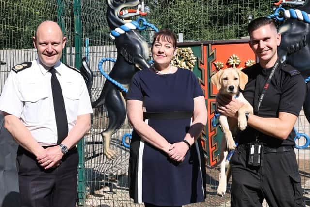 Chief Constable Craig Guildford, Nottinghamshire Police and Crime Commissioner Caroline Henry, handler PC James Sills and Buddy