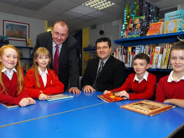 Crescent Primary School head teacher Vic Wilkinson, third left, and his chairman of school governors Darren Langton chat with pupils Laura. Emma, Regan and Thomas at the Bull Farm school in 2011.