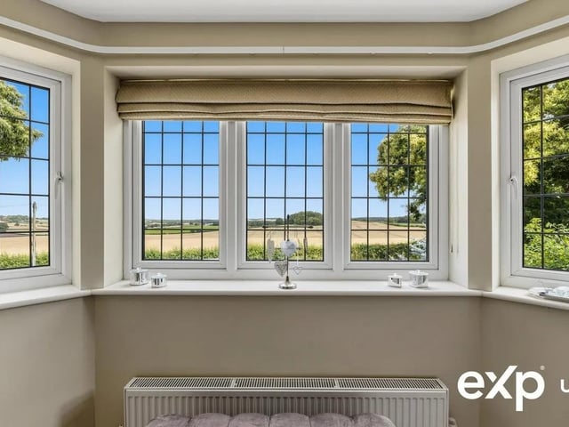 Enjoy waking up to stunning views of open countryside
