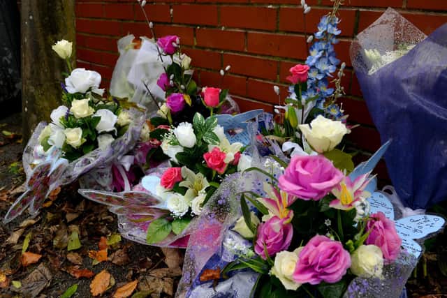 Floral tributes left at Sutton Parkway railway station