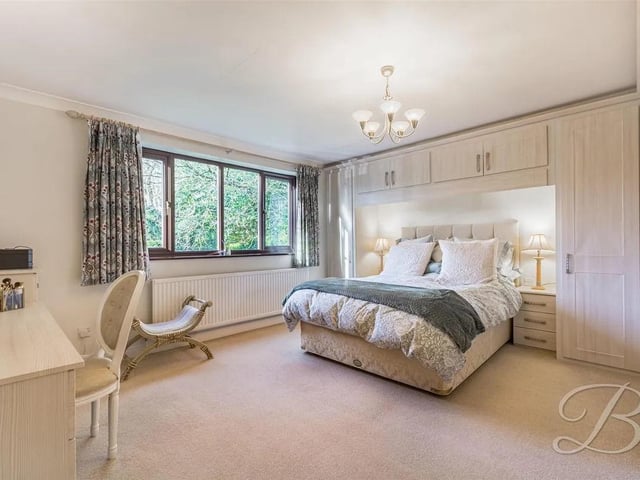 One of four spacious bedrooms featuring ample built in wardrobes.