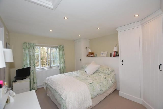 The master bedroom is a good size, with a window overlooking the front of the house and plenty of wardrobes and drawers. There is also an en suite shower room.