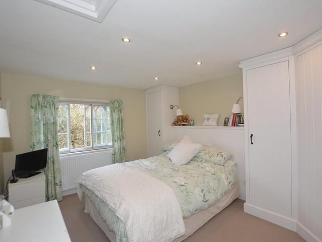 The master bedroom is a good size, with a window overlooking the front of the house and plenty of wardrobes and drawers. There is also an en suite shower room.