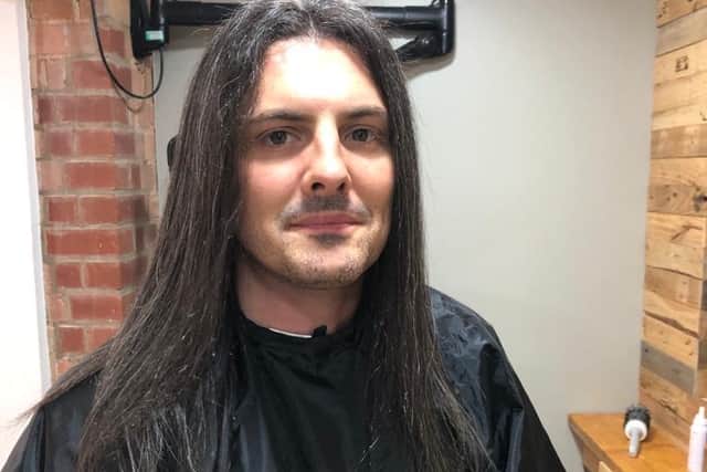 Simon's hair before the chop.