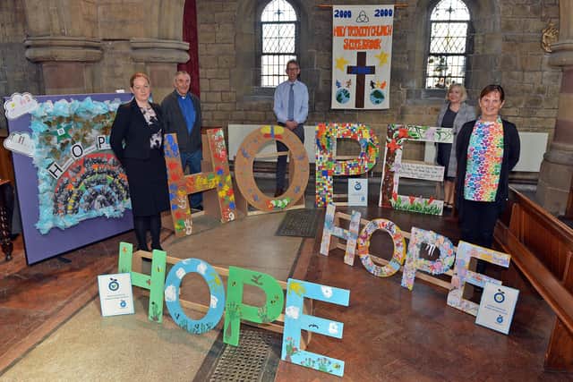 Shirebrook art installation at Shirebrook Holy Trinity Church by The HOPE project.
Sarah Baker CEO of TEAM education trust, Rev John Draycott, Alan Brown principal Model Village School, Patricia Lyons Art co-ordinator and Rev Karen Bradley.