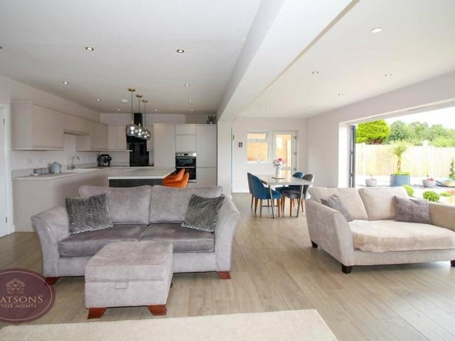 There is only one place to start our tour of the renovated Newthorpe home -- and that's in its impressive hub, which is the open-plan living area or lounge and kitchen.