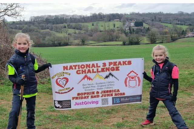 Sophie Wright, left, and her twin sister Jessica are preparing to tackle the Three Peaks Challenge - climbing the highest mountains of England, Scotland and Wales in 24 hours.