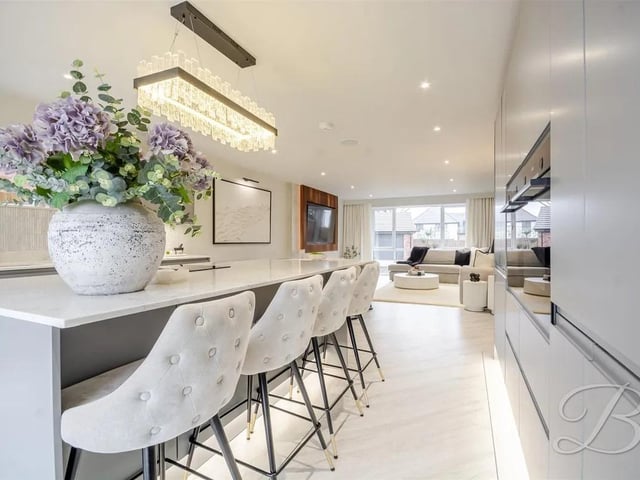 This serene, neutral living area exudes a sense of calm and understated elegance.