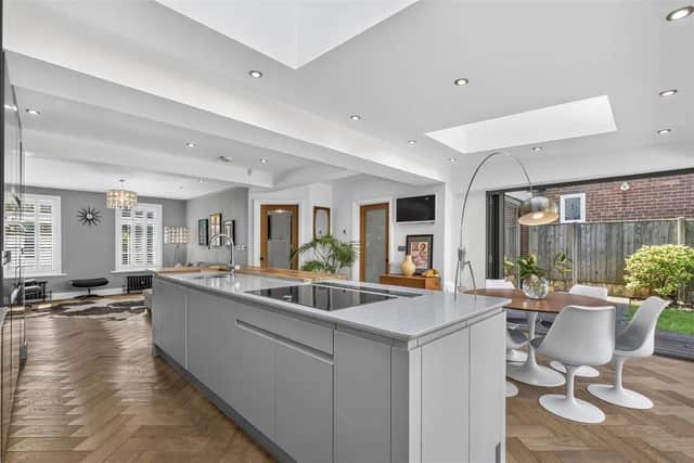 The property boasts a superb open plan living/dining kitchen extension to the rear completed in 2016 to include underfloor heating, a large island, integrated appliances, two large skylights and extensive bi-folding doors looking out onto the garden.