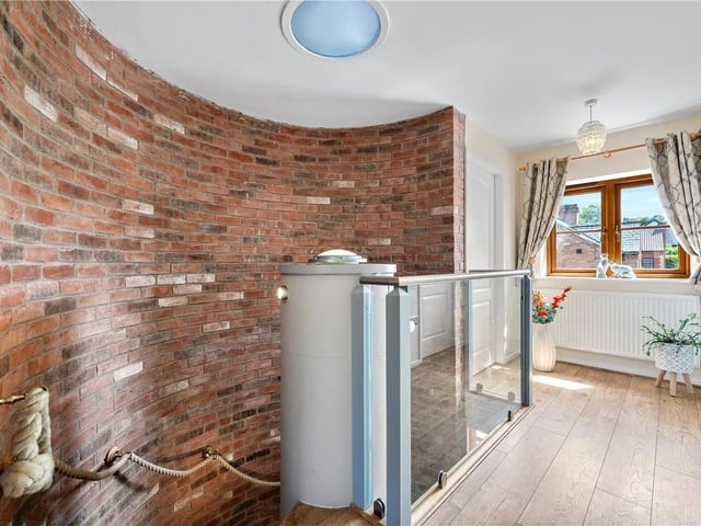 The individually designed home is full of unique architectural features.
