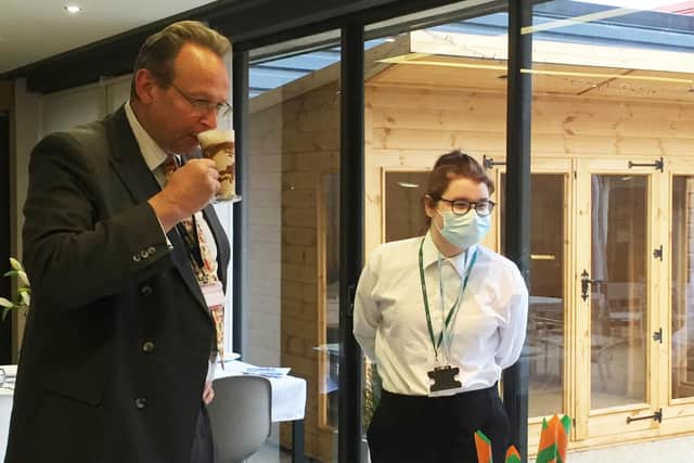 Principal Andrew Cropley judging Brooke Purdie's Jamaican coffee creation