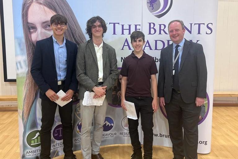 Pictured from left: Mihal Popoaei, Euan Waugh, Nathanial Taylor and principal Carl Atkin. Nathanial achieved top grades in 10 subjects including grade 9s in biology, chemistry, English language, history and maths. Meanwhile, Mihai is celebrating grade 8s in biology, chemistry, computer science, maths and physics; a Distinction in performing arts; grade 7s in English language and history; a grade 6 in English literature; and a grade 5 in statistics.