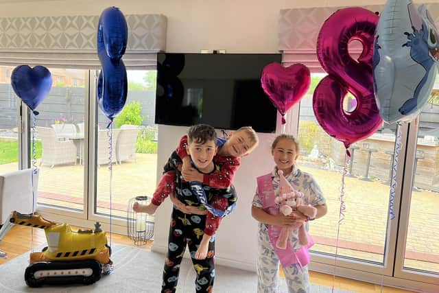 George with his siblins Joseph and Rosa.