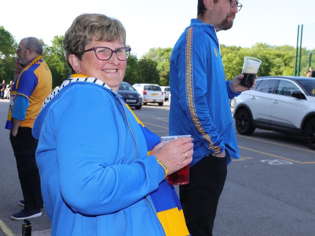 The SSA supportes await the buses.