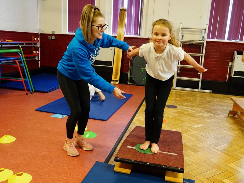 Beth Tweddle Gymnastics visits King Edward Primary School in 2022. Pictured is Samantha Scotland schools co-ordinator at Beth Teddle Gymnastics with year 6 students.