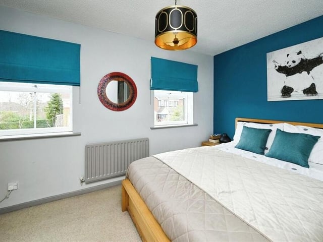 Let's go upstairs now to check out the other three bedrooms. Here is the largest, which has two double-glazed windows facing the front of the Hexham Close house.