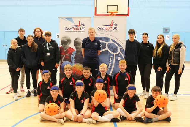 Pupils from Greenwood Primary with sports students and Goalball UK's Stephen Newey