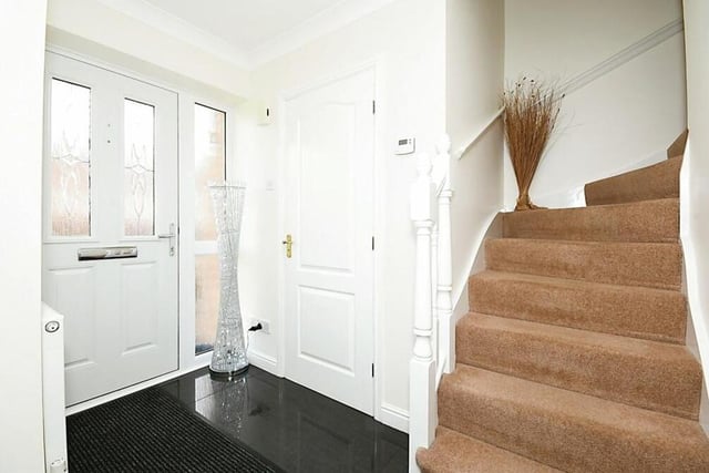 Step through the front door to be greeted by this inviting entrance hall at the Fonton Hall Drive property.