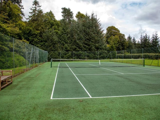 All-weather tennis court.