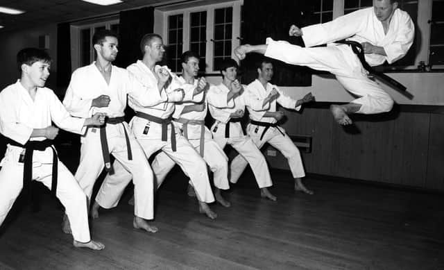 John Herring from Lovedean Karate club flying towars the rest of the group in 1991. The News PP4880